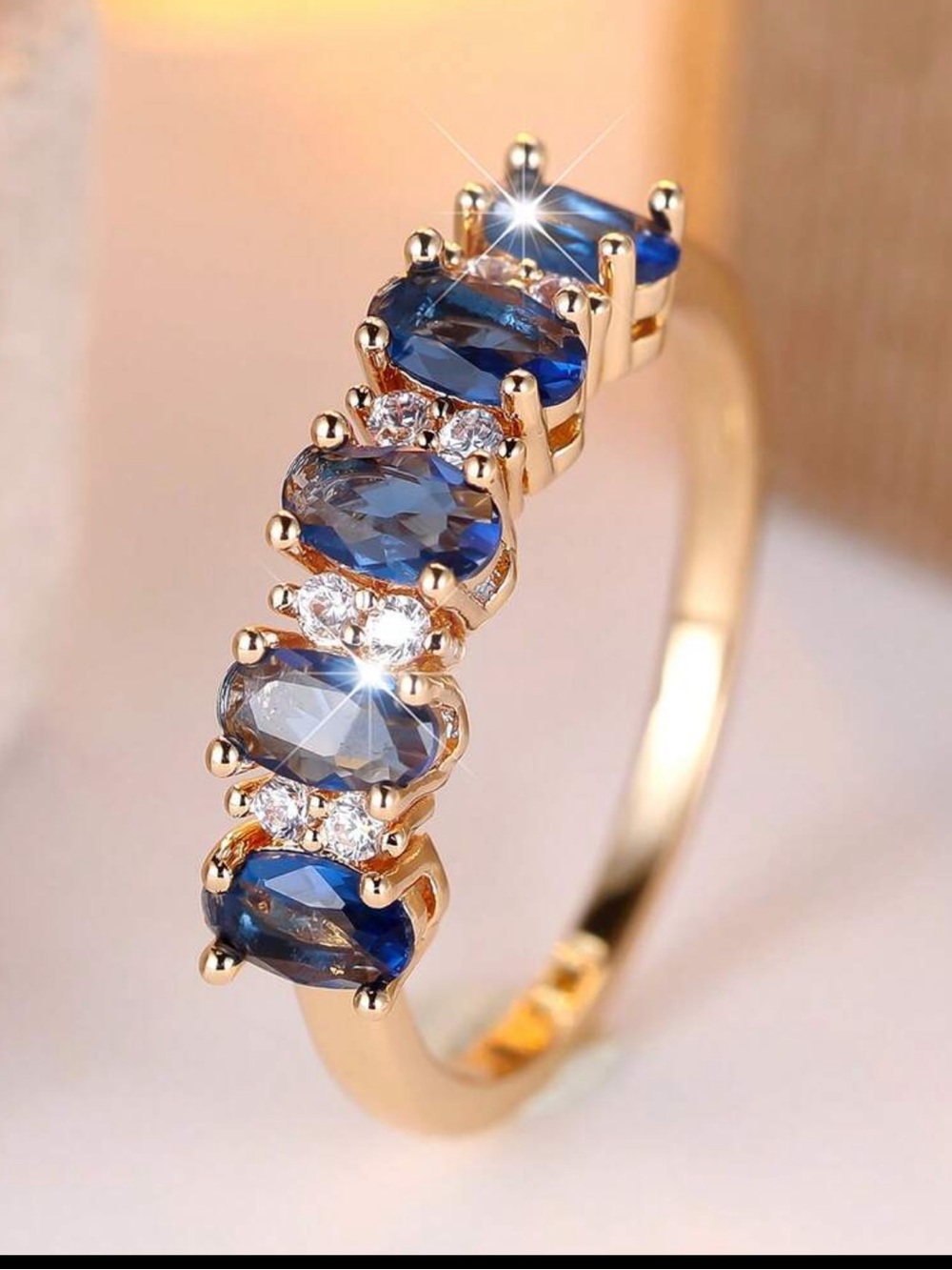 Gold Tone Ring with Deep Blue Oval Stones and Clear Accents - Size 8 NEW!